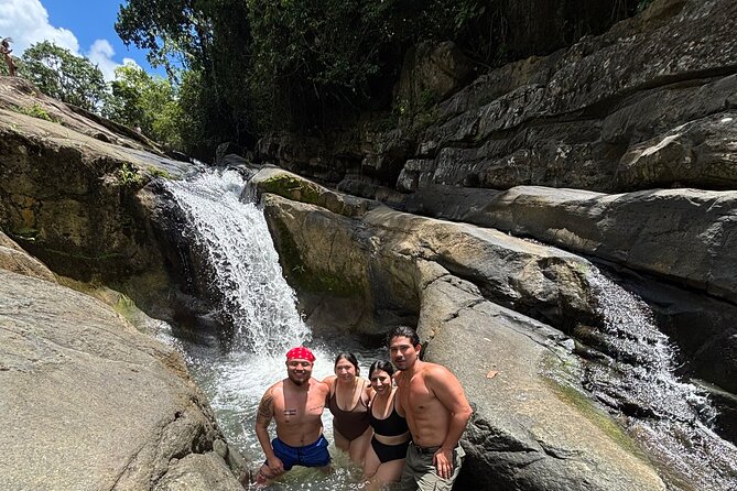 El Yunque Adventure Hiking, River Slides, Waterfalls, Beaches - Hiking in El Yunque, with water at the center