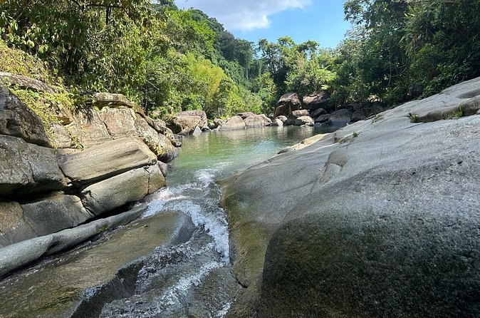 El Yunque & Beach Tour: Waterslide, Waterfall, Food, & Photos - Local food after the water activity