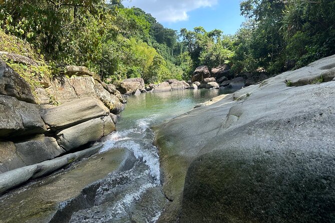 El Yunque & Beach Tour: Waterslide, Waterfall, Food, & Photos - Luquillo Beach gives the day a gentler finish