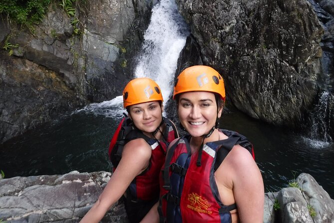 El Yunque Rainforest Tour: Natural Waterslides Adventure - Entering El Yunque by way of rocks and running water