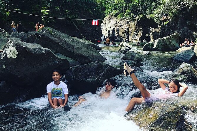 Full-Day Private Tour to Tinajas Waterfalls in El Yunque - Hiking beside the river in El Yunque