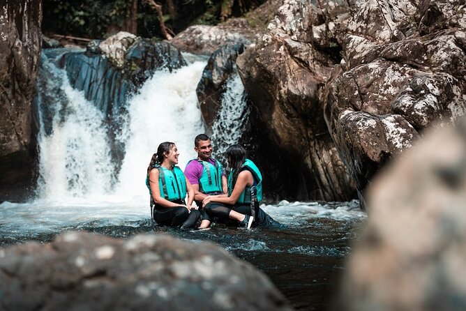 Half-Day: Rainforest and Waterslide Adventure with Transportation - Swimming, Sliding, and River Play