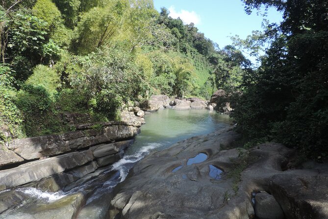 Half-Day Tour: El Yunque, Waterslides, and Luquillo Beach - Entering El Yunque near Las Paylas