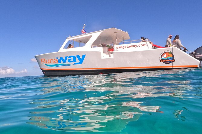 Icacos Double Dip Power Catamaran Snorkel & Beach Tour - Crew service and the onboard atmosphere