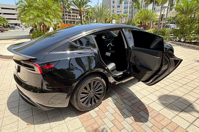 Puerto Rico Island Wide Private Transfers, Tesla 3 Luxury Sedan. - The direct ride to San Juan, Dorado, or Rio Grande