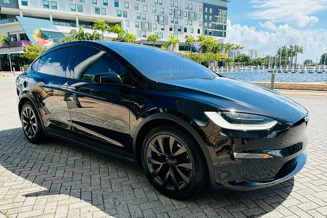 Puerto Rico Island Wide Transfer, Tesla Model X Luxury SUV. - A chauffeur who helps without taking over