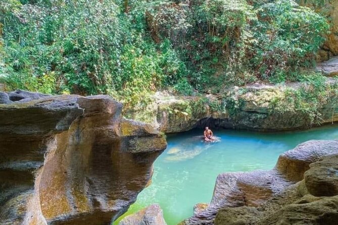 Rainforest Caves and Waterfalls Exploration with Transportation - From Ashford Avenue to Vega Baja’s blue pool