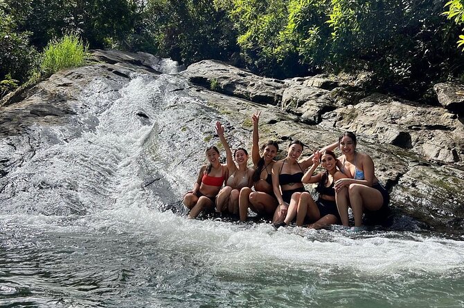 Rainforest Waterfall Slides/Adult Drinks included/ Beach - Sliding down the first waterfall