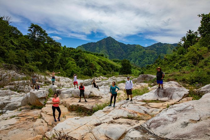 Utuado Canyon, River & Waterfall Adventure in Puerto Rico - Giant volcanic rocks and Taino carvings